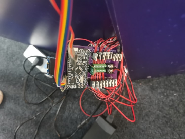 Electronic components installed on a printed circuit board on the back of the display panel.