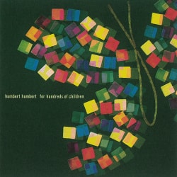 专辑封面，黑色背景下五彩的方块排列成蝴蝶形状。