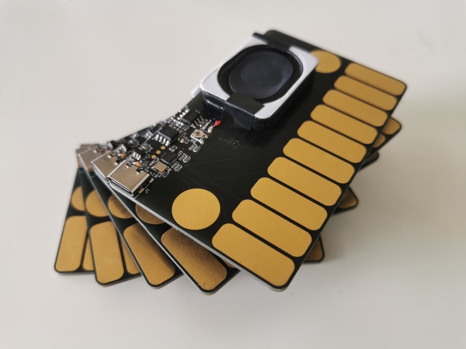 A stack of card-sized electronic devices.